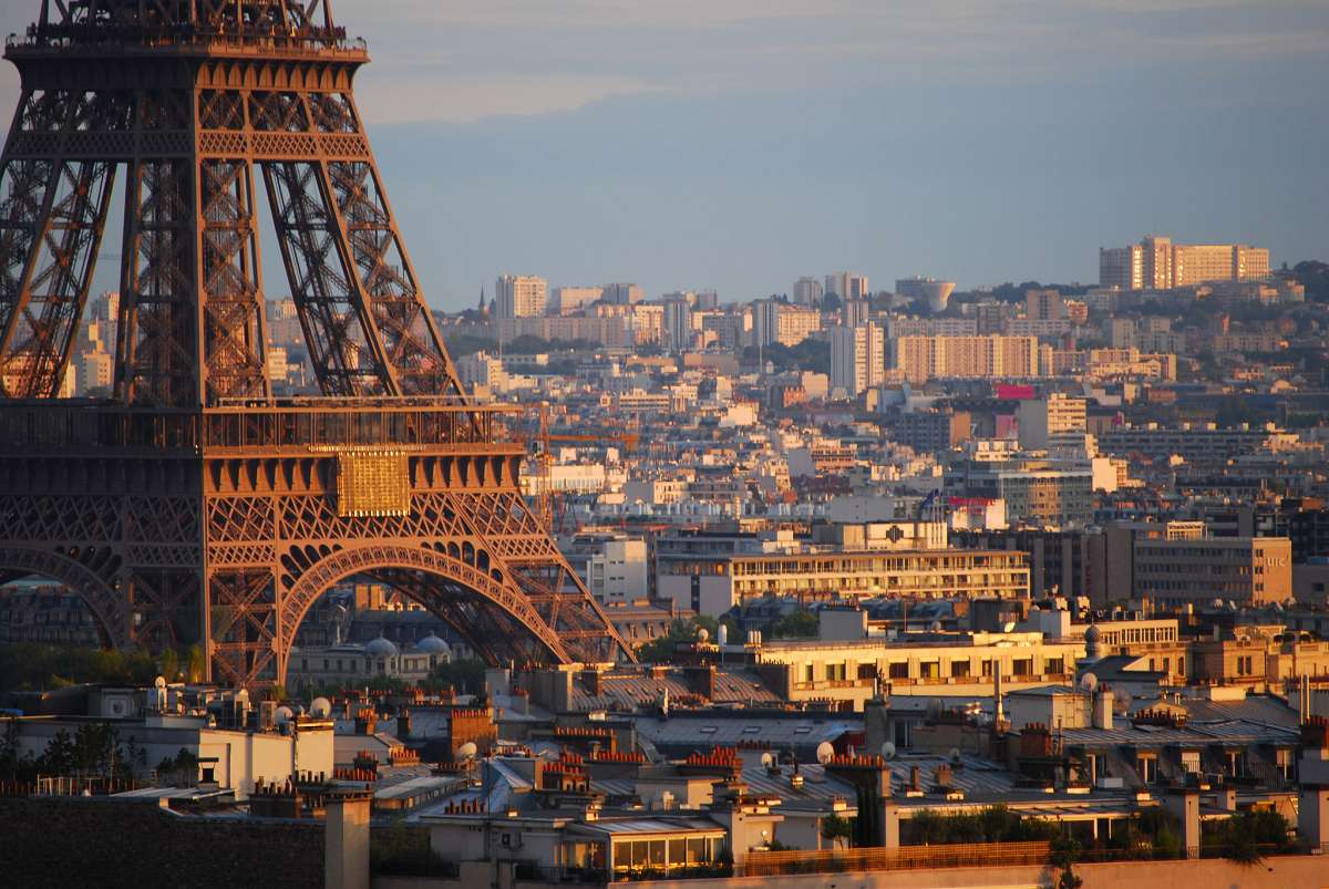 Sunset over the base of Eiffel Tower, Paris